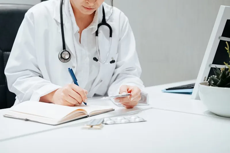 A doctor examines a patient with a herniated disc.