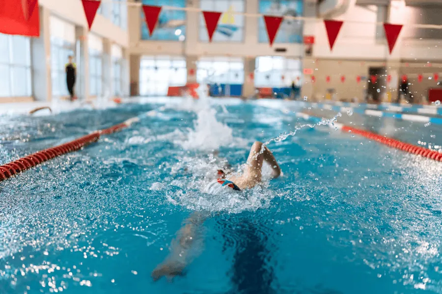 Man swims regularly to prevent sciatic pain.