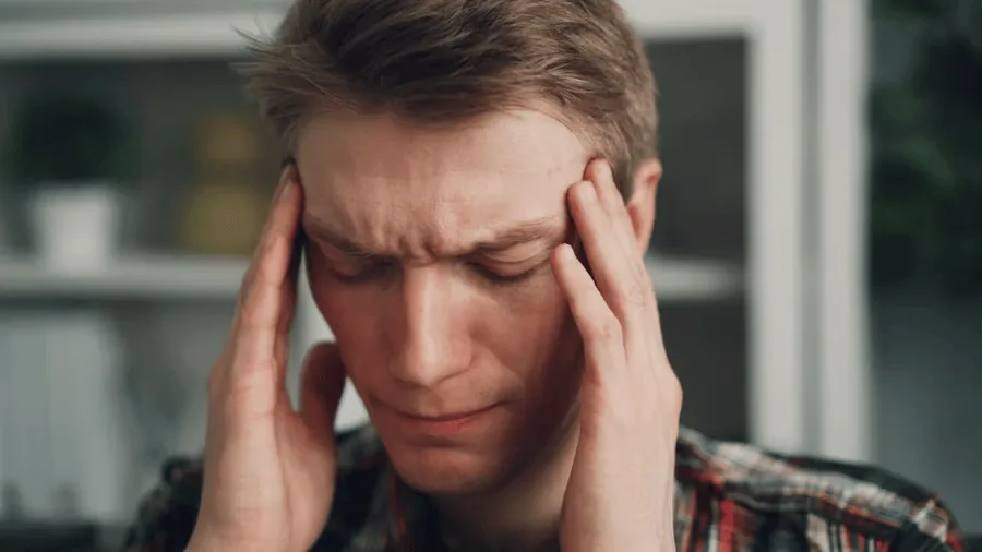 A man suffers from tension headaches.